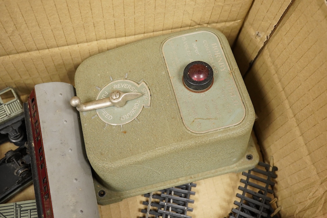 A collection of Hornby Dublo for 2 rail running, including; a boxed BR class A4 4-6-2, Golden Fleece 60030, (2211), together with three boxed bogie coaches and two wagons, plus four unboxed wagons, and a complete box set